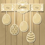 Easter eggs on the wooden background