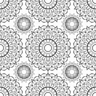 Ornament with a stylized sun