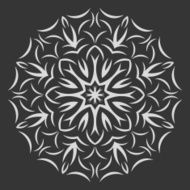 Round white flower pattern on black background