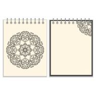 White cover notebook with handmade black pattern