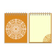 Orange cover notebook with round pattern