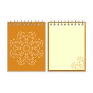 Orange cover notebook with round ornate star pattern