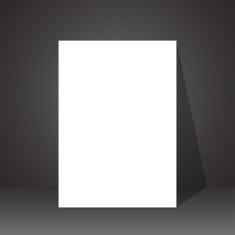 piece of paper is on the floor with a shadow