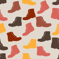Seamless colorful background made of boots in flat simple design