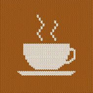 White knitted cup of coffee or tea