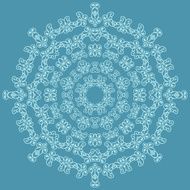 Round ornate pattern on blue background