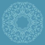 Round lacy pattern on blue background