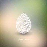 Easter egg on blurred background with place for your text