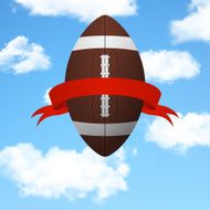 Football with ribbon flying in the sky
