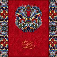 red invitation card with neat ethnic background