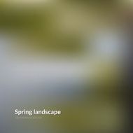 blurred green landscape background