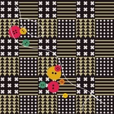 needle thread and buttons on fabric