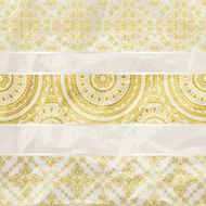 floral borders on crumpled golden foil paper texture