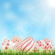 Red Easter egg in a grass