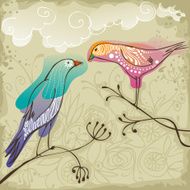 two birds sitting on branches