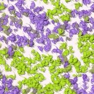 Randomly scattered abstract shapes in violet and green