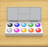 Watercolor paint set isolated on wood background