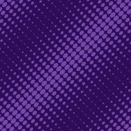 Diagonal halftone of purple oval dots on a background