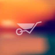 wheelbarrow icon on blurred background