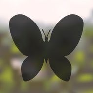 butterfly icon on blurred background
