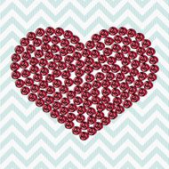 Pink heart made of roses on a blue