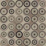 Connected wheels on brown background