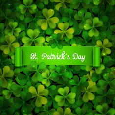 Saint Patricks Day card green ribbon on realistic shamrock leaves