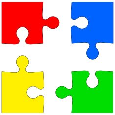 Four colored puzzle pieces on white background
