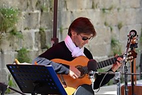 musician guitar singing at street