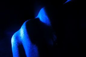 blue fist in darkness, detail