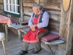 old man in alpine hut