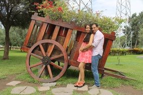 happy couple posing in the Park