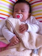 sleeping baby, newborn girl with dummy