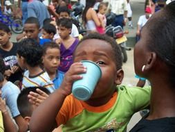 a crowd of black children