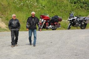 bikers go down the street