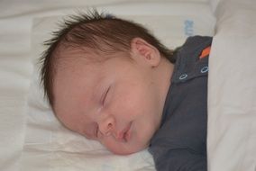 baby is sleeping in crib