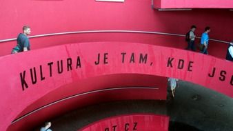 people on the stairwell in prague