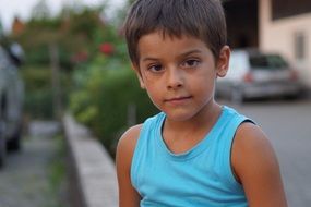 tanned boy in t-shirt