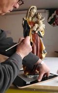 gilded statuette of St. Maria with a child