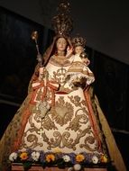 figurine of the madonna with a child in her arms