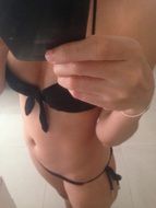 Selfie of a girls in black bikini