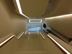 man on escalator