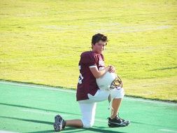 young american football player at the stadium