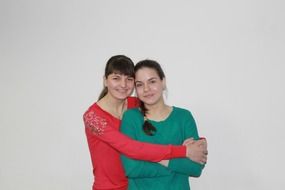 portrait of two girls on a white background