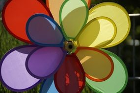 colorful pinwheel in a garden