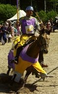 knight fighting on horseback