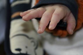 hand of a small child