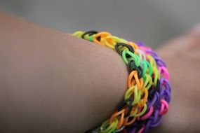 bracelet of colored rubber bands on the arm