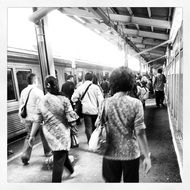 people movement to the train at the station