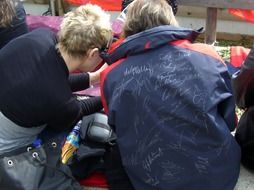 autographs on the back of an athlete
